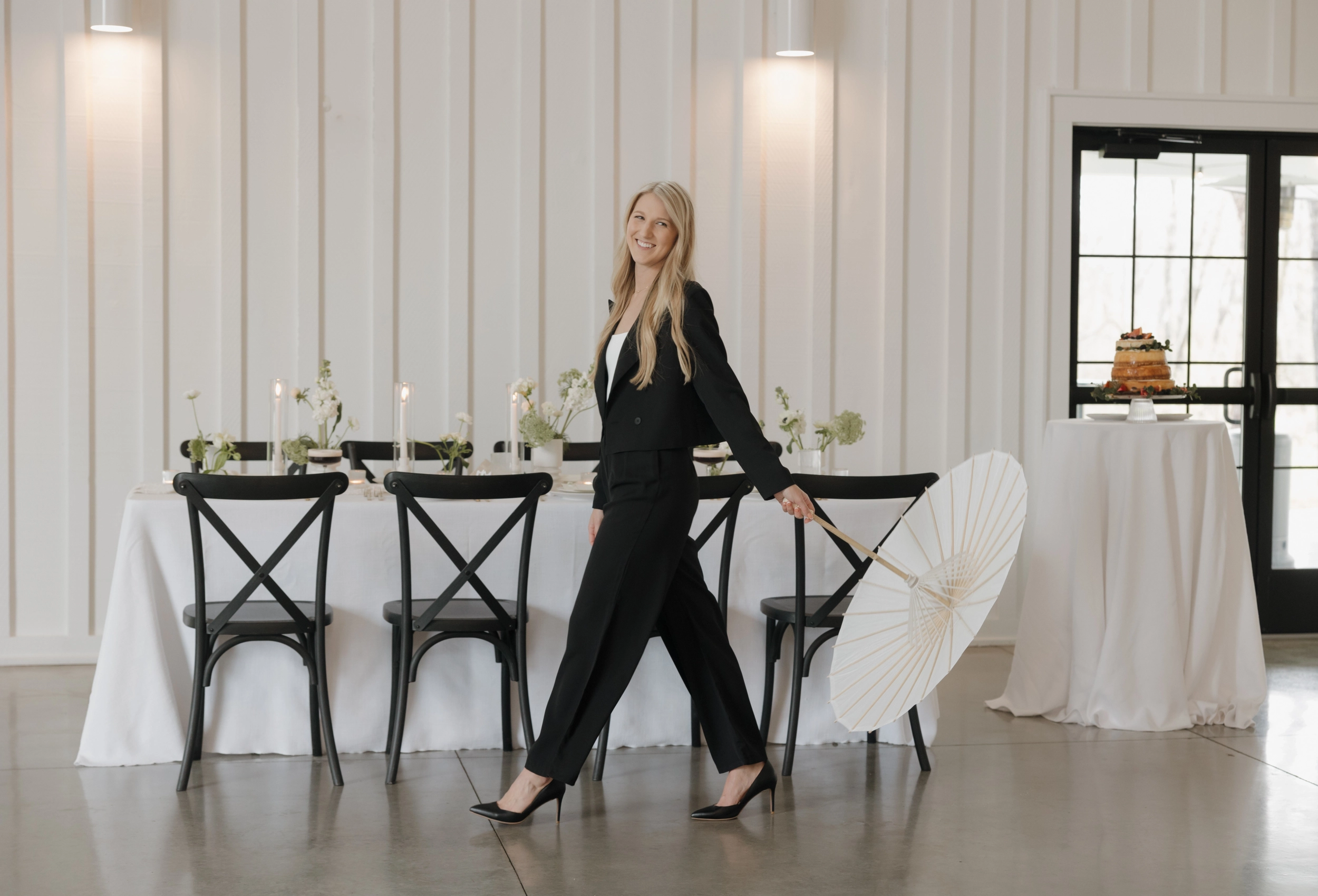 Madison Westfall posing in front of a tablescape